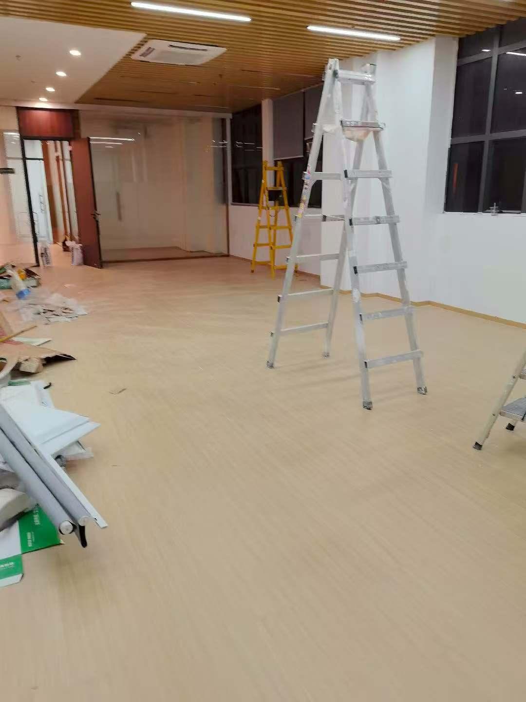 New three-layer solid wood flooring in cream color for the office